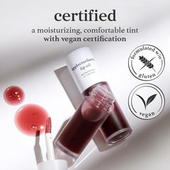 NOONI Applecranberry Lip Oil swatch reveals natural color and glossy finish.