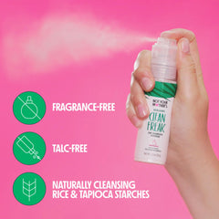 Not Your Mother's Clean Freak Dry Shampoo Powder applying to roots for oil absorption.
