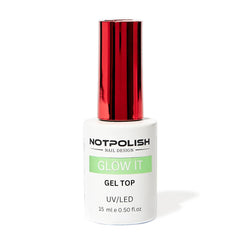 Notpolish Glow-It Gel Top Coat bottle glowing in the dark for vibrant nighttime nails.