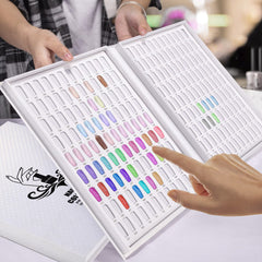 Noverlife Professional 216 Nail Colors Chart open spread showing color comparisons for clients.