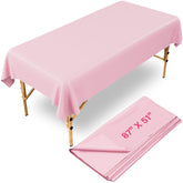 Noverlife wax pad bed cover on table in pink protects surfaces during esthetic treatments.