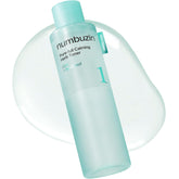Numbuzin No.1 Toner bottle pouring with calming hydration.