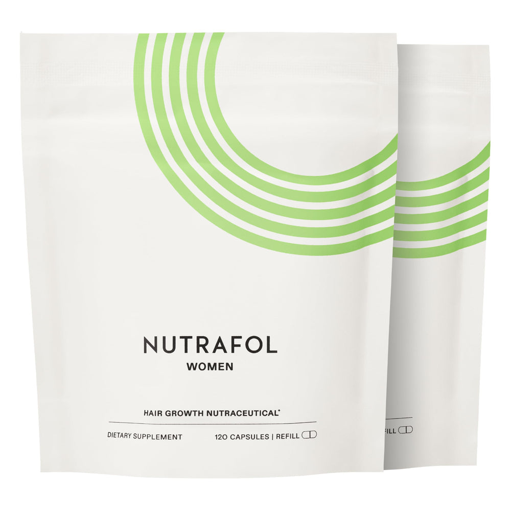 Nutrafol Women bottle close-up with capsules promoting fuller hair.