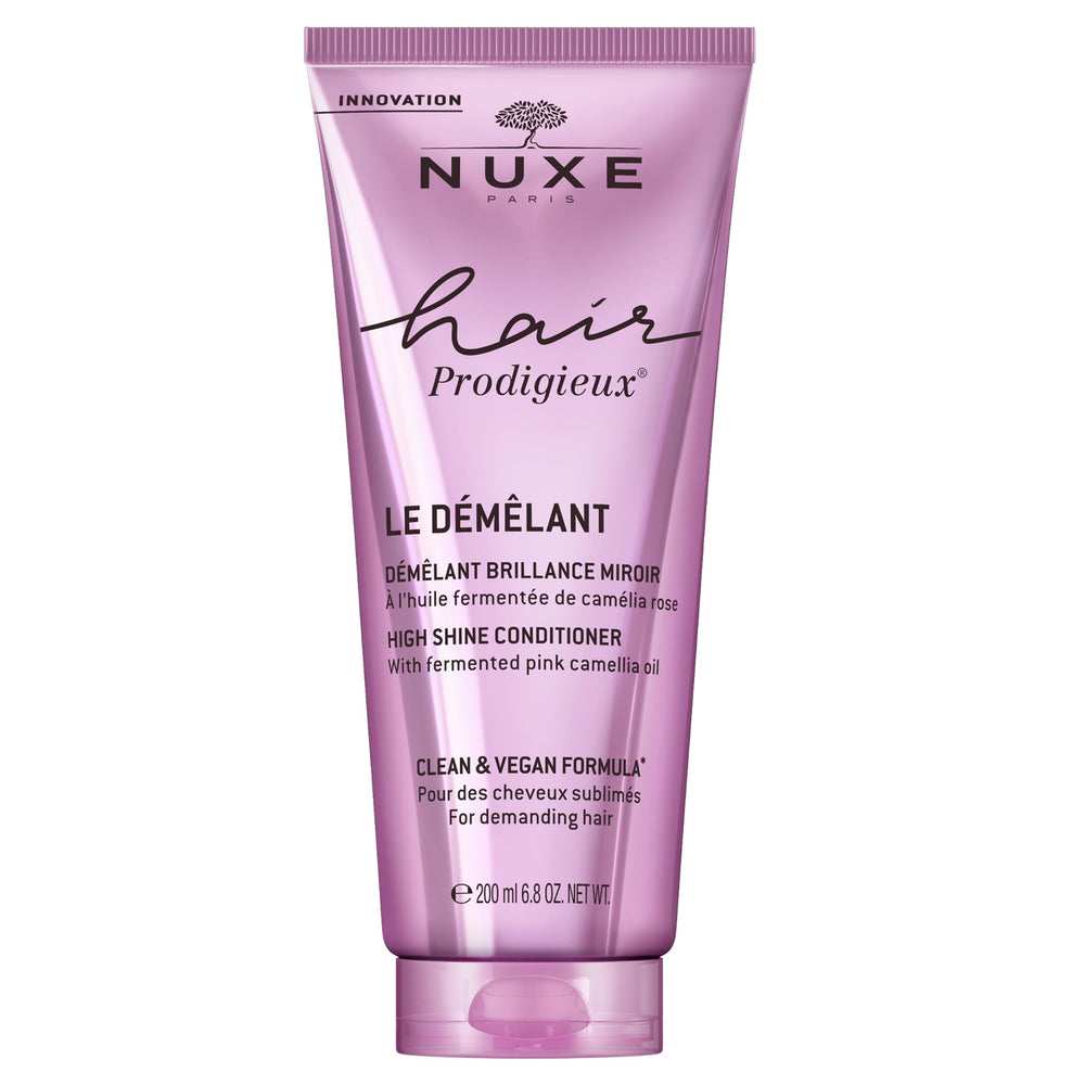 NUXE Hair Prodigieux High Shine Conditioner bottle closeup highlights nourishing detangling for silky hair