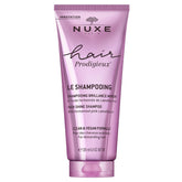 Nuxe Hair Prodigieux High Shine Shampoo bottle for daily shine nourishment.