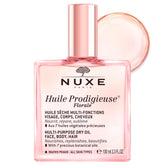 Nuxe Huile Prodigieuse Floral bottle closeup for radiant skin and hair hydration.
