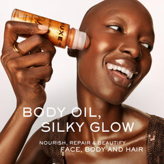 Nuxe Huile Prodigieuse Shimmer Roll-On bottle closeup highlights shimmering oil and glow.
