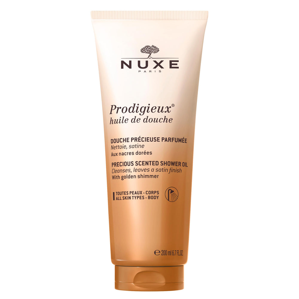 Nuxe Prodigieux gel de ducha vegano en botella dorada, piel suave.