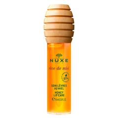 Nuxe Rêve de Miel lip gloss bottle close-up showing glossy shine for moisturized lips