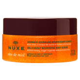 Nuxe Reve de Miel scrub packaging shows luxury exfoliator for dry skin.