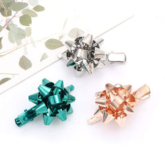 NVENF Christmas bow hair clip silver pairs with glam festive ensembles