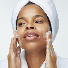Obagi Nu-Derm Foaming Gel foamy-lather texture visible during washing.