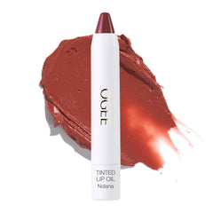 Ogee Nolana lip oil bottle closeup showing terracotta tint for daily wear