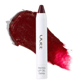 Ogee Tinted Sculpted Lip Oil Dahlia swatch delivers buildable burgundy color