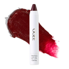 Ogee Tinted Sculpted Lip Oil Dahlia swatch delivers buildable burgundy color
