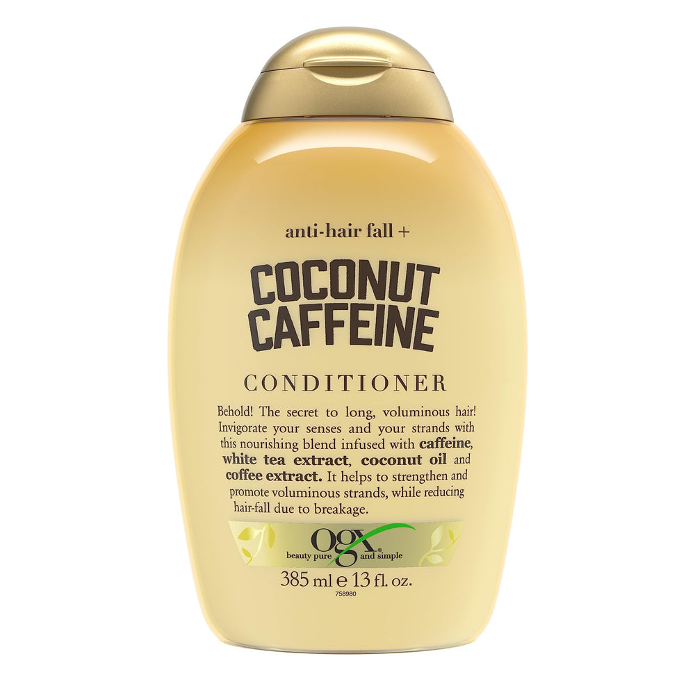 OGX anti-hair fall coconut caffeine conditioner bottle showing strengthening benefits