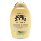 OGX Anti-Hair Fall Coconut Caffeine shampoo bottle front promotes fuller-looking hair.