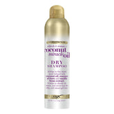 OGX dry shampoo bottle shows tropical coconut scent and oil-absorbing action for between-washes