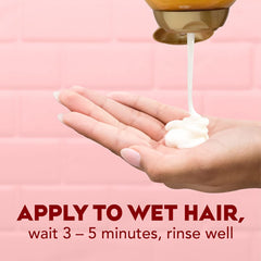 OGX wet hair with conditioner application demonstrating ease of use
