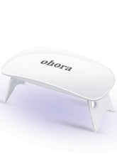 ohora Care LED lamp front view demonstrates compact, on-the-go gel nail curing.