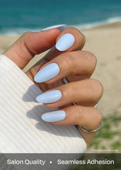 ohora greyish blue nail wraps on nails with glossy finish