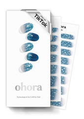 ohora N Waterbomb blue glitter nail wraps close-up shows vivid shimmer and salon-quality finish
