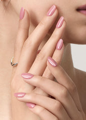 ohhora semi cured gel nail strips n bare plum applying on nail demonstrates easy, mess-free application