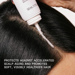 Olaplex applying serum to scalp illustrating targeted soothing and barrier support