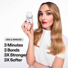 Applying Olaplex N°.3PLUS to damp hair before shampoo for instant softness and strength