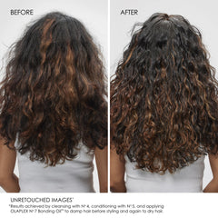 Olaplex No.4 shampoo and No.5 conditioner in hand demonstrating gentle cleansing and hydration