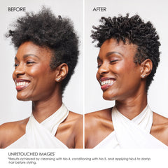 Applying Olaplex Nº.5 to mid-lengths and ends in shower for easier detangling