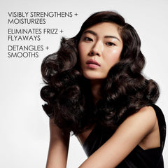 Olaplex Nº.5 pump dispensing creamy conditioner showing rich texture benefit