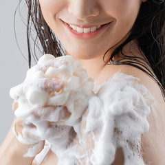 Olay Ultra Moisture lather foam texture demonstrating rich moisturizing cleansing