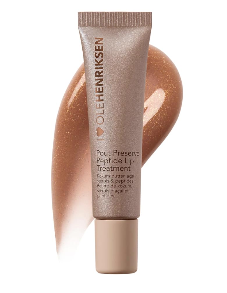 Ole Henriksen Pout Preserve lip treatment tube close-up showing Creme Brulee Glimmer hydrating formula