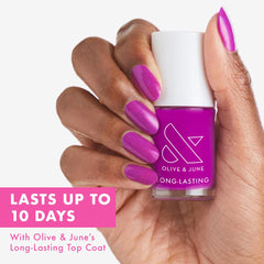 Olive & June grape soda nail polish brush applying even color across nails.
