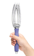 Olivia Garden detangling and styling brush in use for effortless smoothing.