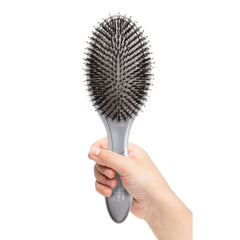 Olivia Garden Ceramic Ion Supreme Paddle Brush side view emphasizing ergonomic handle for comfortable styling.