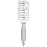 Olivia Garden Ceramic and Ion Turbo Vent Pro brush close-up highlights ceramic coating for smooth styling.