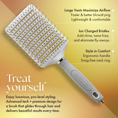 Olivia Garden Ceramic + Ion XL Pro Paddle Brush in use during blow-dry with airflow