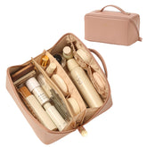 Omeily travel makeup bag opened to reveal its large capacity and easy-access interior storage.