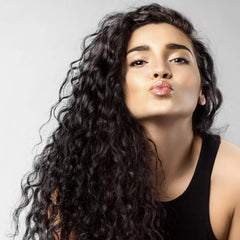 One 'N Only hair mask on shiny hair shows improved elasticity and glow.