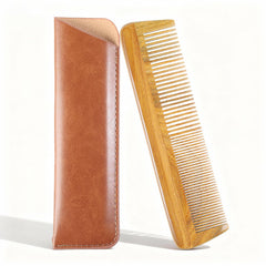 Onedor green sandalwood comb held in hand shows natural grain for comfortable grooming.