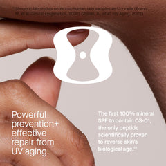 OneSkin FACE SPF OS-01 tinted swatch blending with darker skin tones.