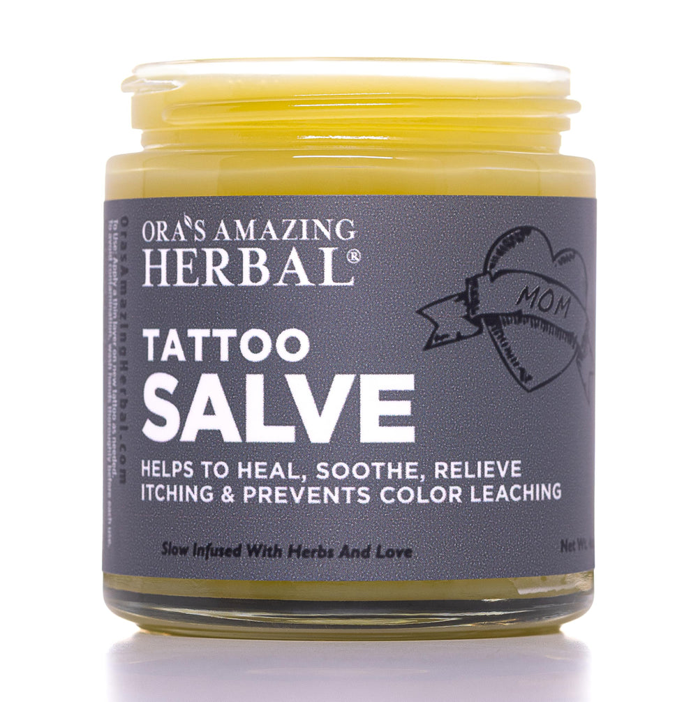 Ora's Amazing Herbal Tattoo Salve glass jar for premium tattoo aftercare and hydration.