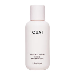 OUAI Anti Frizz Cream travel-size packaging for on-the-go frizz control.