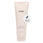 OUAI Curl Cream bottle closeup, silicone-free formula for defined, hydrated curls.
