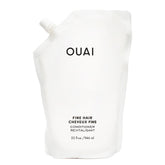 OUAI Fine Hair Conditioner Refill bottle closeup showing potential soft volume
