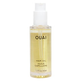 OUAI Hair Oil bottle with gloss finish promotes smooth, shiny hair.