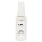 OUAI leave-in conditioner bottle demonstrating heat protection for styling sessions