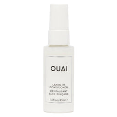 OUAI leave-in conditioner bottle demonstrating heat protection for styling sessions